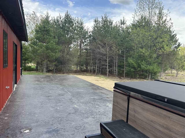 1645 Riley Rd, Kalkaska, MI 49646 - view of patio with a hot tub