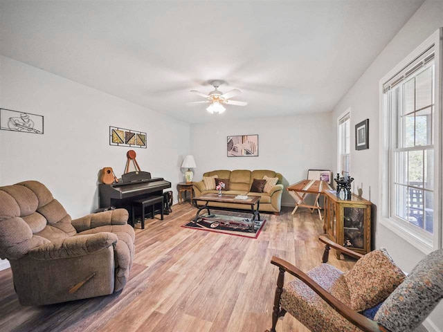 2729 Ranney Rd, East Jordan, MI 49727 - living area featuring light wood-style floors and ceiling fan