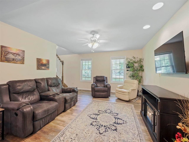 2729 Ranney Rd, East Jordan, MI 49727 - living area featuring light wood finished floors, a ceiling fan, recessed lighting, and stairs
