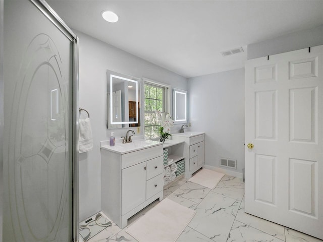 2729 Ranney Rd, East Jordan, MI 49727 - full bath with marble finish floors, vanity, baseboards, a shower with door, and recessed lighting