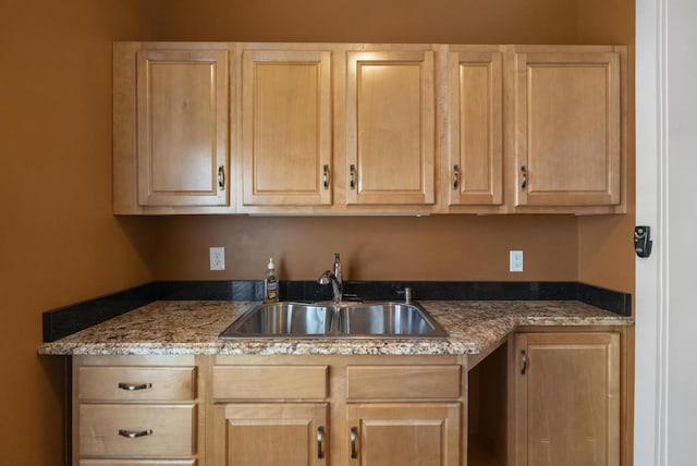 702 Michigan, Petoskey, MI 49770 - kitchen featuring light brown cabinetry and a sink