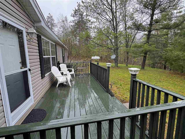 15500 Riverside Trl, Wolverine, MI 49799 - wooden terrace with a lawn