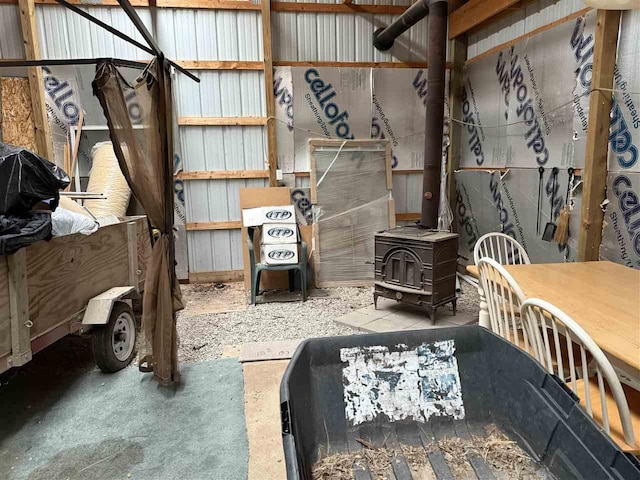 15500 Riverside Trl, Wolverine, MI 49799 - misc room featuring a wood stove
