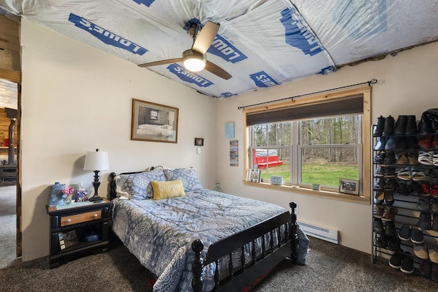 3622 Big Sky Trl, Gaylord, MI 49735 - carpeted bedroom featuring baseboard heating and a ceiling fan