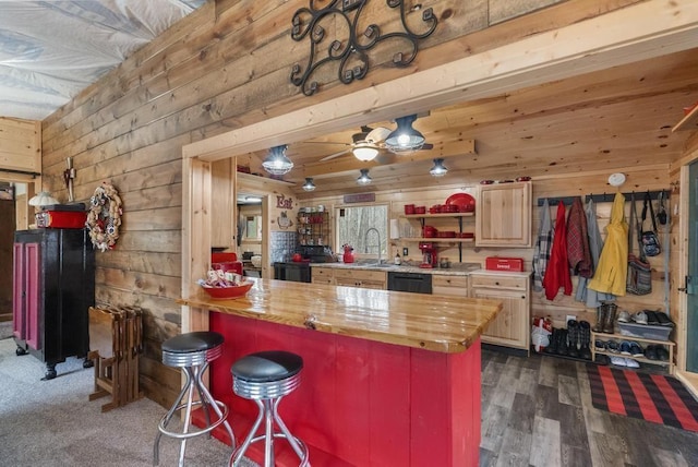 3622 Big Sky Trl, Gaylord, MI 49735 - kitchen featuring wood walls, wooden counters, dishwasher, a kitchen breakfast bar, and a sink