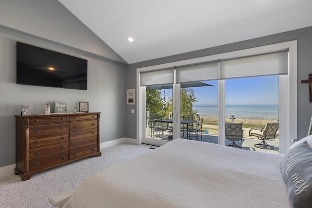4435 Lake Shore Dr, Charlevoix, MI 49720 - carpeted bedroom featuring access to exterior, lofted ceiling, a water view, baseboards, and recessed lighting