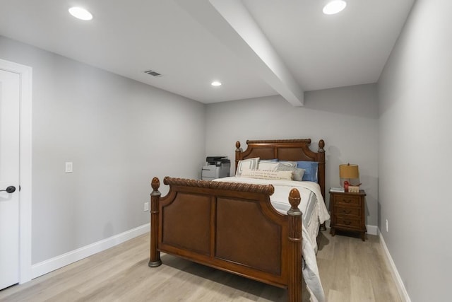 4435 Lake Shore Dr, Charlevoix, MI 49720 - bedroom featuring light wood finished floors, recessed lighting, baseboards, and beamed ceiling