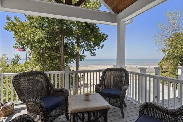 4435 Lake Shore Dr, Charlevoix, MI 49720 - wooden terrace with view of water and beach