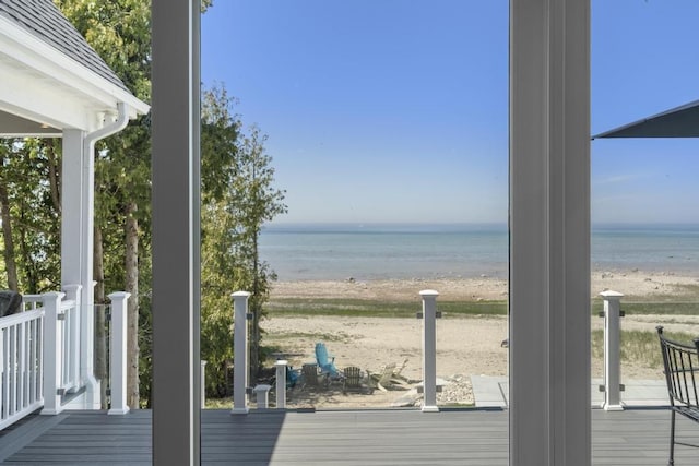4435 Lake Shore Dr, Charlevoix, MI 49720 - wooden terrace featuring view of water and beach