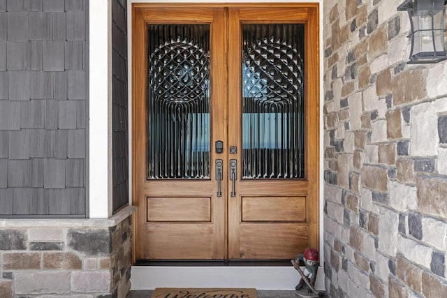 4435 Lake Shore Dr, Charlevoix, MI 49720 - property entrance featuring french doors