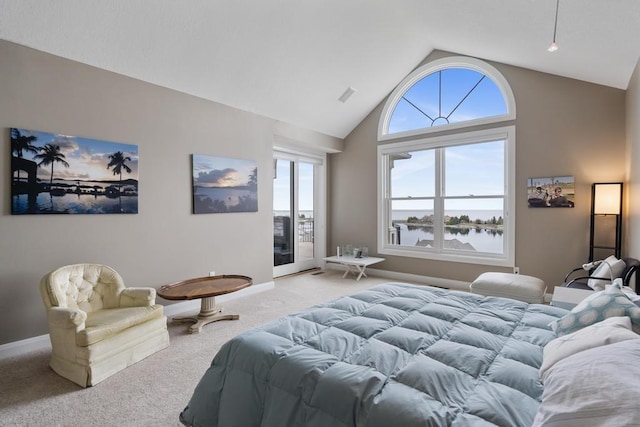 4104 Harborview Rdg Unit 28, Bay Harbor, MI 49770 - carpeted bedroom with a water view, access to outside, high vaulted ceiling, and baseboards
