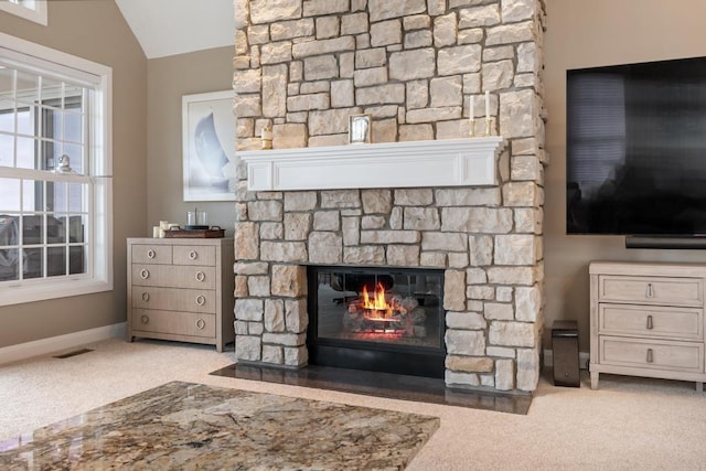 4104 Harborview Rdg Unit 28, Bay Harbor, MI 49770 - detailed view of carpet, a fireplace, and baseboards