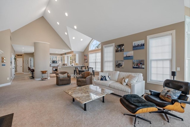 4104 Harborview Rdg Unit 28, Bay Harbor, MI 49770 - living room with carpet, high vaulted ceiling, recessed lighting, and baseboards
