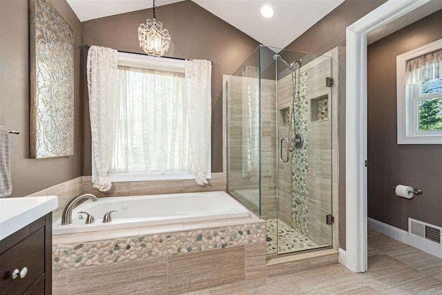 1766 Chippewa Bch, Indian River, MI 49749 - full bath featuring a bath, a shower stall, vanity, lofted ceiling, and a chandelier