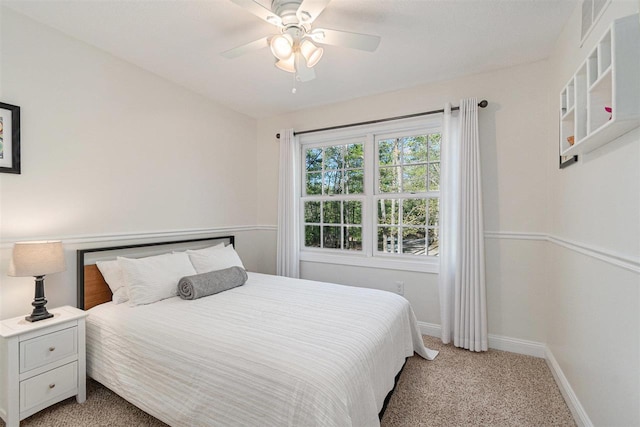 1766 Chippewa Bch, Indian River, MI 49749 - bedroom with light colored carpet and ceiling fan