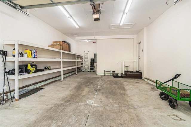 1766 Chippewa Bch, Indian River, MI 49749 - garage with a garage door opener