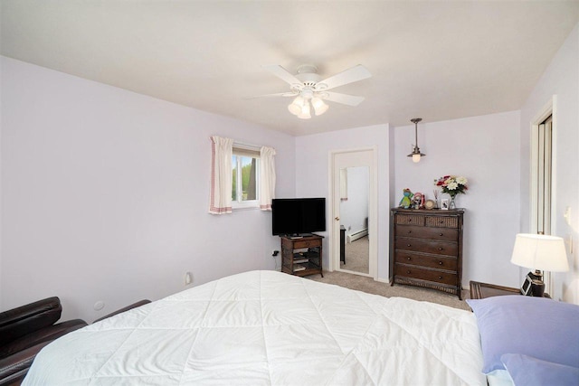 806 Arlington Unit 11, Petoskey, MI 49770 - bedroom featuring carpet flooring and a ceiling fan