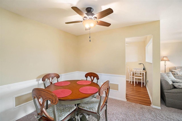 806 Arlington Unit 11, Petoskey, MI 49770 - carpeted dining space featuring a ceiling fan