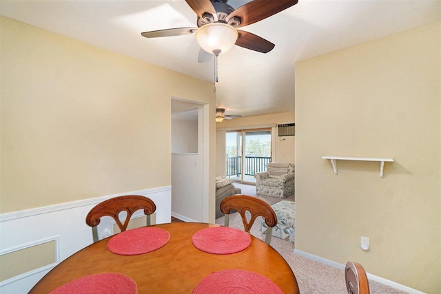 806 Arlington Unit 11, Petoskey, MI 49770 - carpeted dining space featuring a ceiling fan