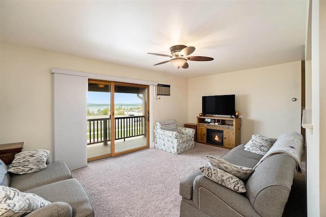 806 Arlington Unit 11, Petoskey, MI 49770 - carpeted living room featuring ceiling fan