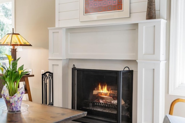2018 Greenbriar Ter, Harbor Springs, MI 49740 - dining area view of a warm lit fireplace