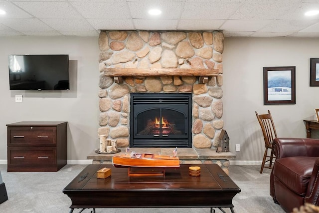 2018 Greenbriar Ter, Harbor Springs, MI 49740 - living area featuring carpet, baseboards, a stone fireplace, and recessed lighting