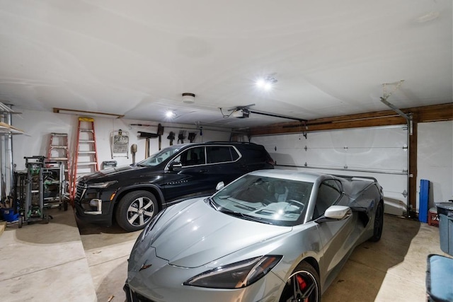2018 Greenbriar Ter, Harbor Springs, MI 49740 - garage featuring a garage door opener