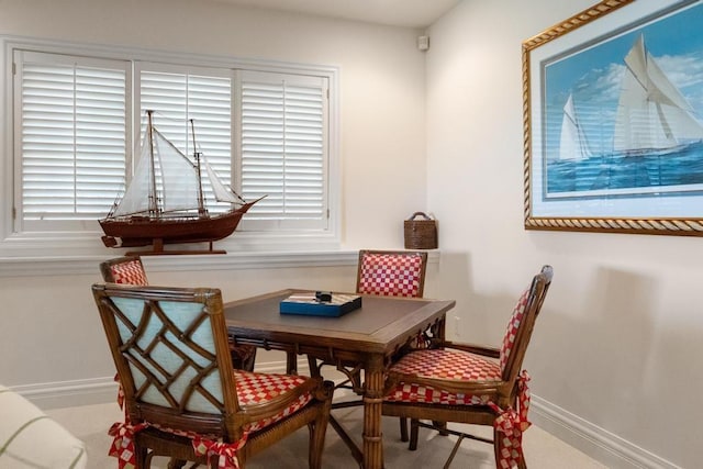 4064 Harborview Rdg Unit 17, Bay Harbor, MI 49770 - dining space with baseboards