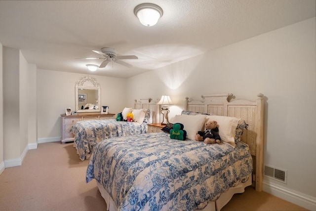 4064 Harborview Rdg Unit 17, Bay Harbor, MI 49770 - carpeted bedroom with baseboards and a ceiling fan