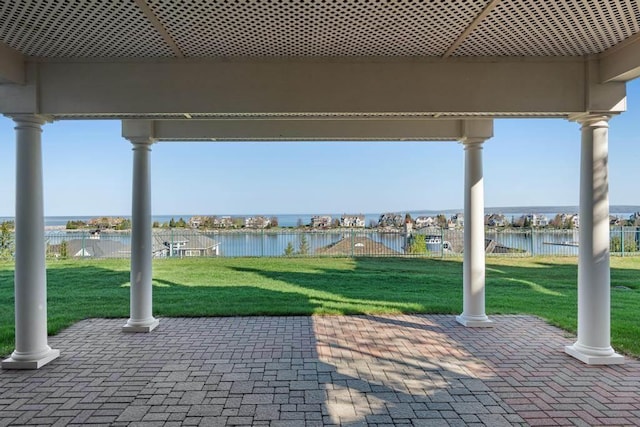 4064 Harborview Rdg Unit 17, Bay Harbor, MI 49770 - view of patio / terrace with a water view