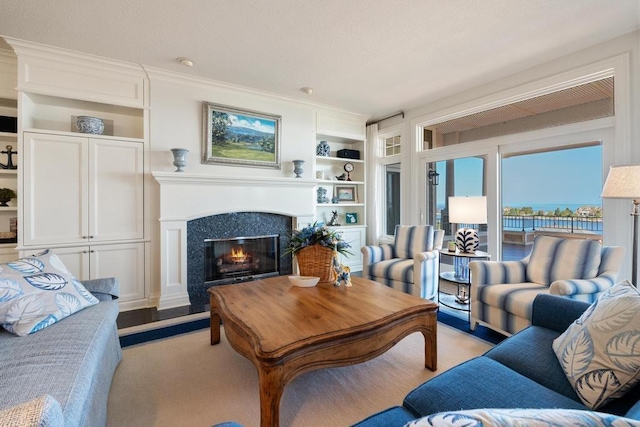 4064 Harborview Rdg Unit 17, Bay Harbor, MI 49770 - living room with a premium fireplace and ornamental molding