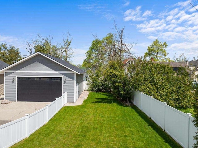 917 Grove St, Petoskey, MI 49770 - view of yard featuring a detached garage
