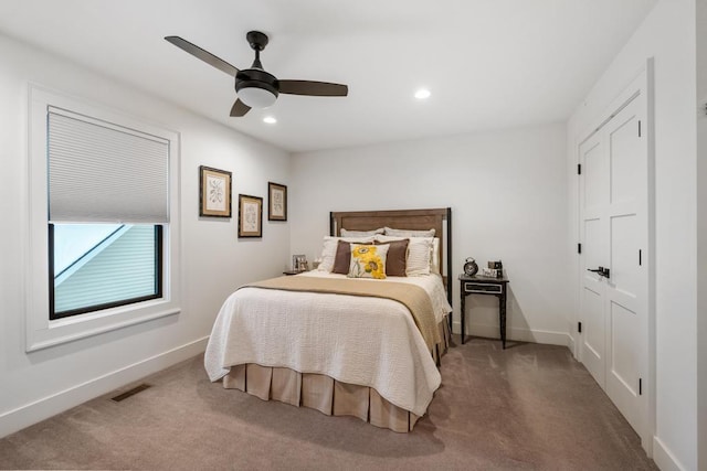 917 Grove St, Petoskey, MI 49770 - carpeted bedroom featuring baseboards, a ceiling fan, and recessed lighting