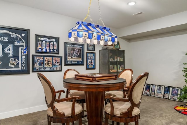 917 Grove St, Petoskey, MI 49770 - carpeted dining room featuring baseboards