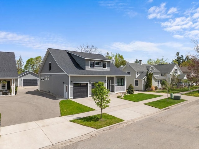 917 Grove St, Petoskey, MI 49770 - view of front of property featuring driveway, a front lawn, and a residential view