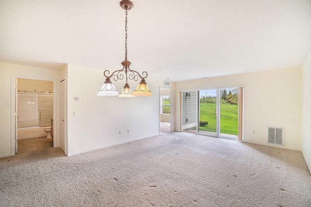 1556 Emerald Ct Unit 89, Petoskey, MI 49770 - unfurnished room featuring carpet and baseboards