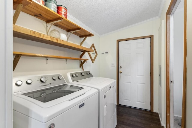 7245-83 Upper Kelsey Dr, Charlevoix, MI 49720 - washroom featuring washing machine and dryer, crown molding, dark wood-style flooring, and a textured ceiling