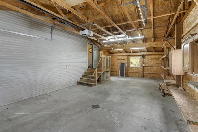 7245-83 Upper Kelsey Dr, Charlevoix, MI 49720 - garage with a garage door opener