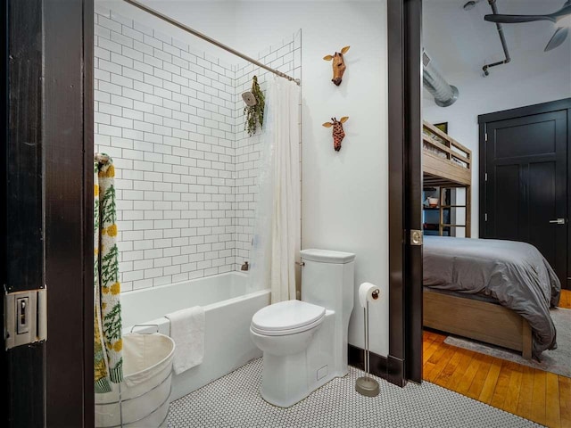 422 E Mitchell Unit 1, Petoskey, MI 49770 - ensuite bathroom with shower / tub combo and toilet