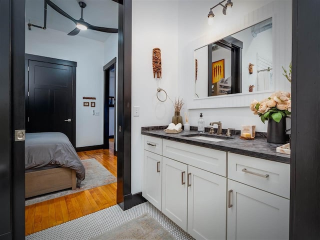 422 E Mitchell Unit 1, Petoskey, MI 49770 - bathroom featuring vanity and wood finished floors