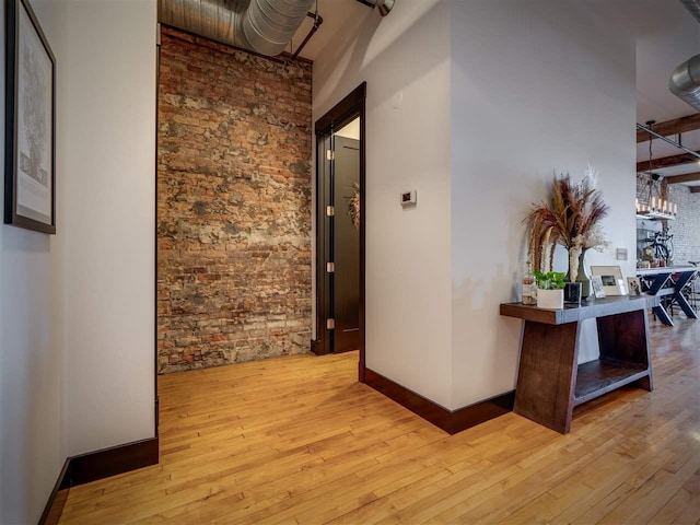 422 E Mitchell Unit 1, Petoskey, MI 49770 - hallway with hardwood / wood-style flooring