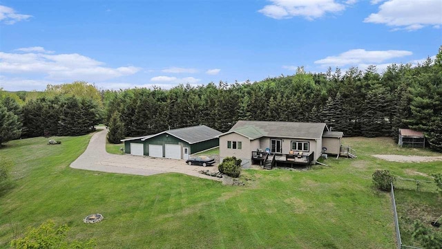 4024 Behling, Boyne City, MI 49712 - aerial view of property and surrounding area featuring a heavily wooded area