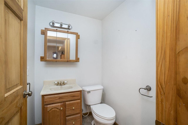 4024 Behling, Boyne City, MI 49712 - bathroom featuring vanity and toilet