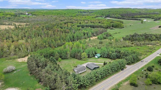 4024 Behling, Boyne City, MI 49712 - aerial view of property and surrounding area with a heavily wooded area