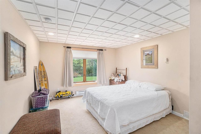 9030 Sugar Tree Ln, Charlevoix, MI 49720 - bedroom with carpet flooring, a baseboard heating unit, and baseboards