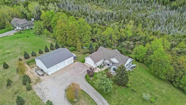 9030 Sugar Tree Ln, Charlevoix, MI 49720 - view of property location with a forest