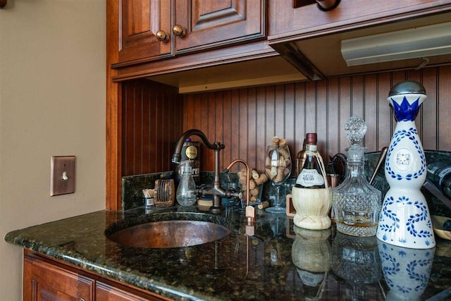 8530 Dustin Ln, East Jordan, MI 49727 - detailed view of a sink and wooden walls