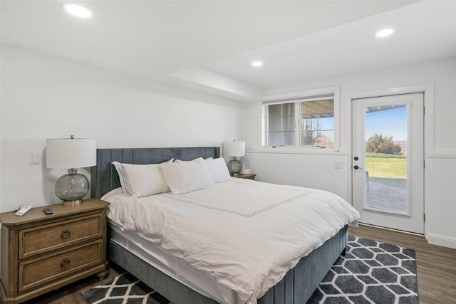 8530 Dustin Ln, East Jordan, MI 49727 - bedroom featuring access to exterior, dark wood finished floors, and recessed lighting
