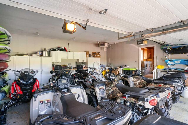 8530 Dustin Ln, East Jordan, MI 49727 - garage with a garage door opener