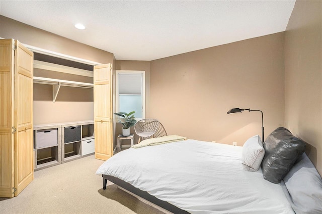 302 Quaintance Ave, Petoskey, MI 49770 - bedroom with light colored carpet and recessed lighting